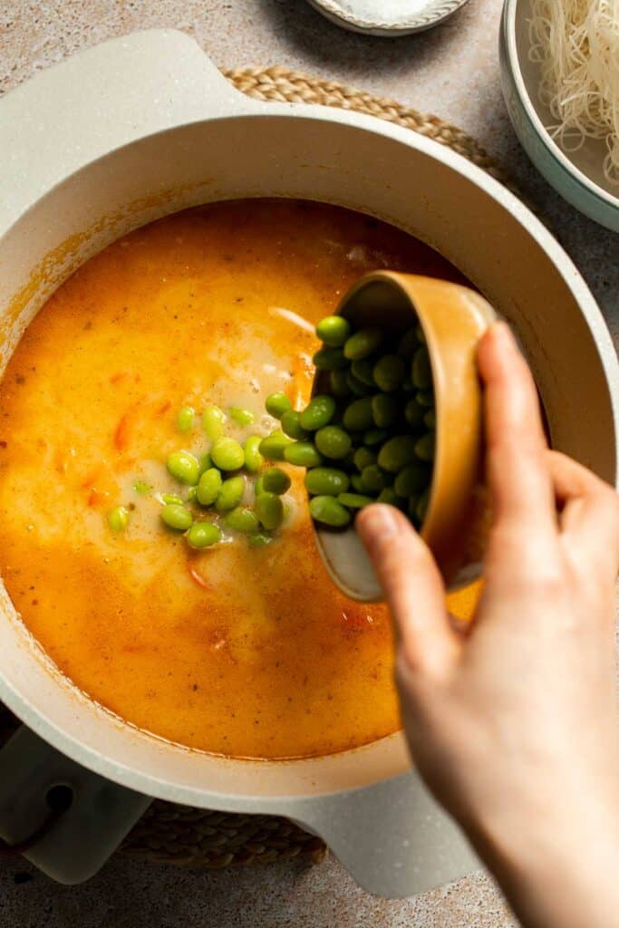 Creamy Thai Coconut Soup with Chickpeas is a cozy, protein-packed vegetarian noodle soup with a rich coconut curry broth and bold flavor. | aheadofthyme.com