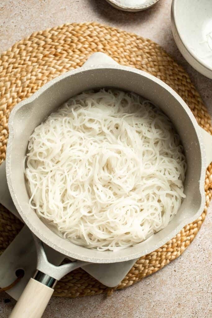 Creamy Thai Coconut Soup with Chickpeas is a cozy, protein-packed vegetarian noodle soup with a rich coconut curry broth and bold flavor. | aheadofthyme.com