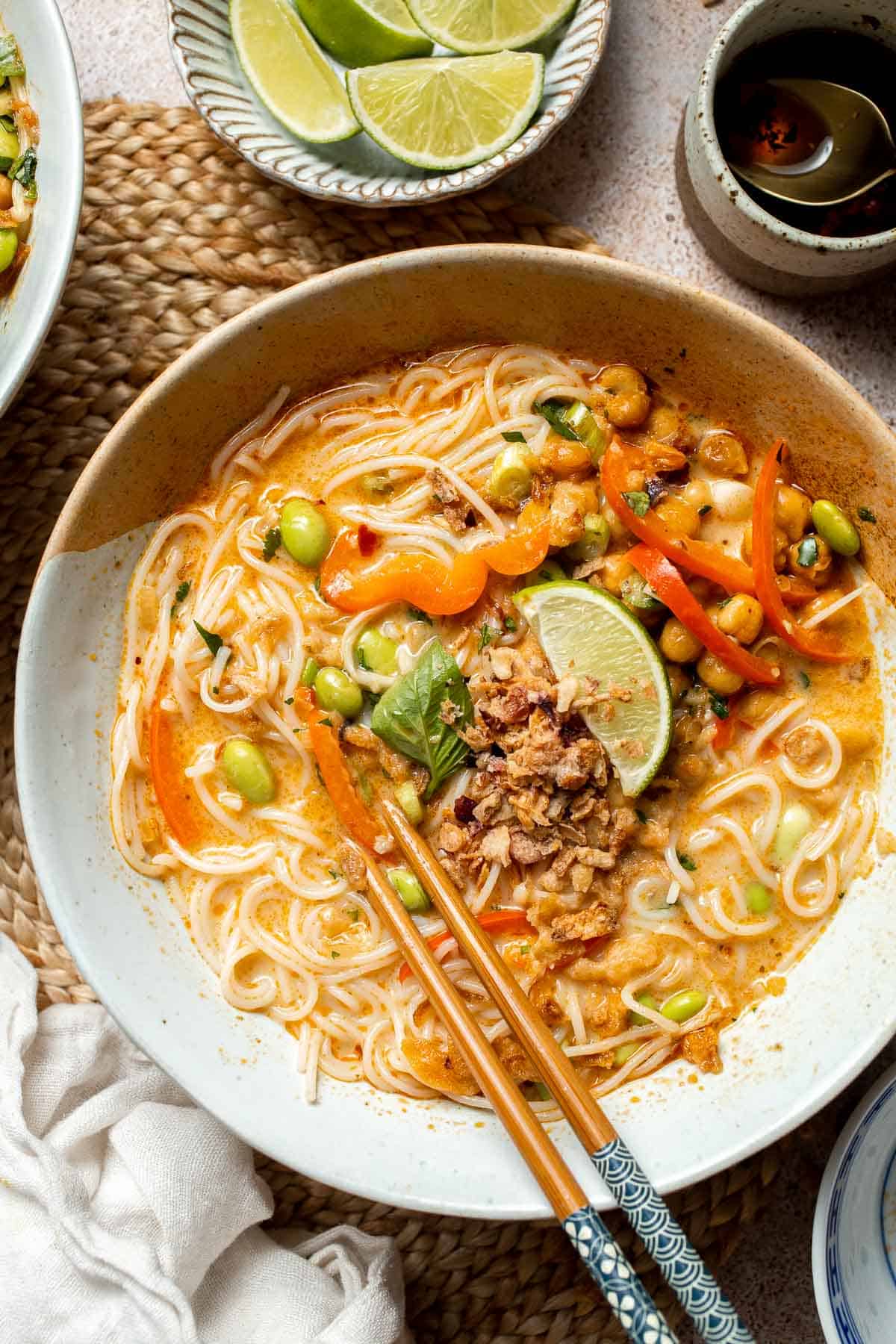 Creamy Thai Coconut Soup with Chickpeas is a cozy, protein-packed vegetarian noodle soup with a rich coconut curry broth and bold flavor. | aheadofthyme.com