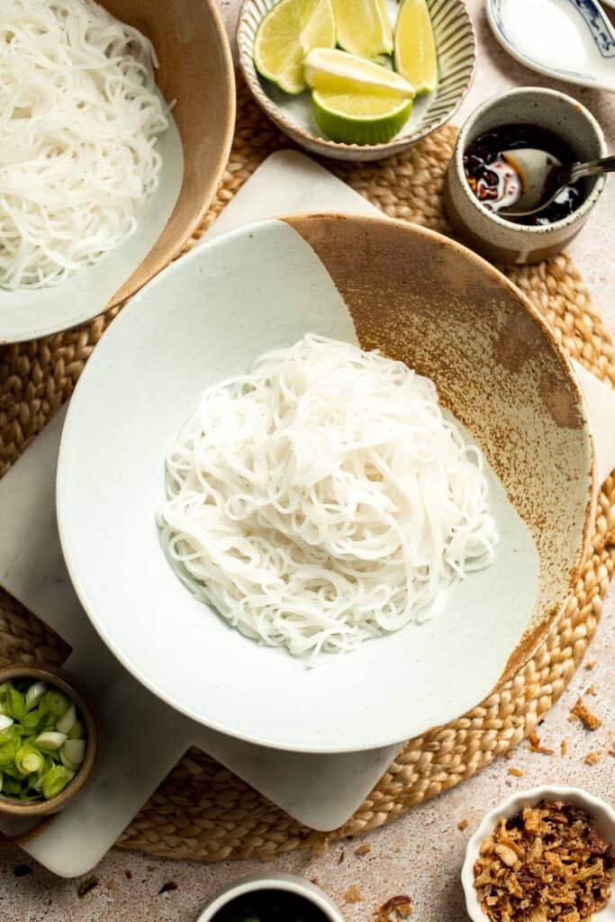 Creamy Thai Coconut Soup with Chickpeas is a cozy, protein-packed vegetarian noodle soup with a rich coconut curry broth and bold flavor. | aheadofthyme.com