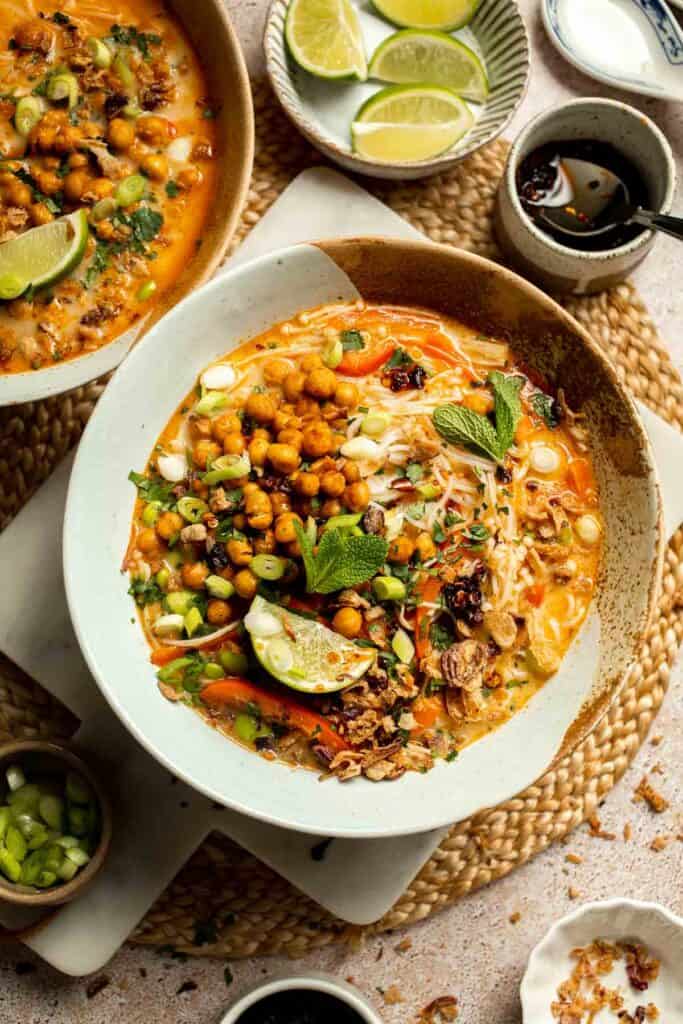 Creamy Thai Coconut Soup with Chickpeas is a cozy, protein-packed vegetarian noodle soup with a rich coconut curry broth and bold flavor. | aheadofthyme.com