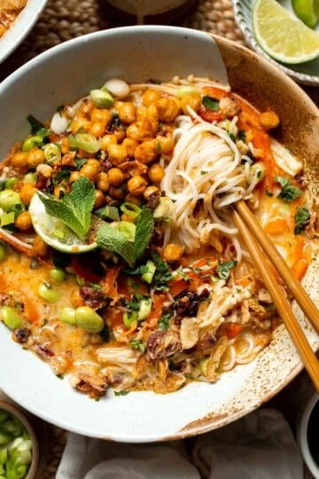 Creamy Thai Coconut Soup with Chickpeas is a cozy, protein-packed vegetarian noodle soup with a rich coconut curry broth and bold flavor. | aheadofthyme.com