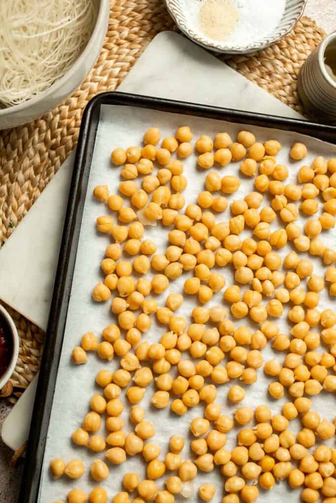 Creamy Thai Coconut Soup with Chickpeas is a cozy, protein-packed vegetarian noodle soup with a rich coconut curry broth and bold flavor. | aheadofthyme.com