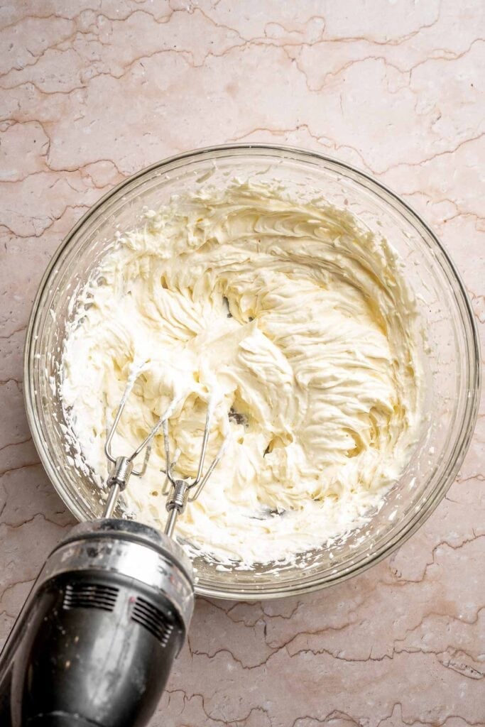 Tiramisu Cookies are soft espresso cookies topped with fluffy mascarpone cream and a dusting of cocoa. Elegant, easy, and perfect for coffee lovers. | aheadofthyme.com