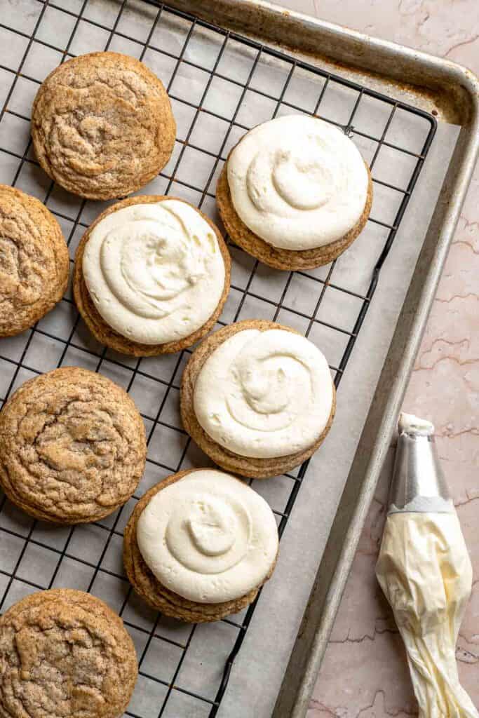 Tiramisu Cookies are soft espresso cookies topped with fluffy mascarpone cream and a dusting of cocoa. Elegant, easy, and perfect for coffee lovers. | aheadofthyme.com