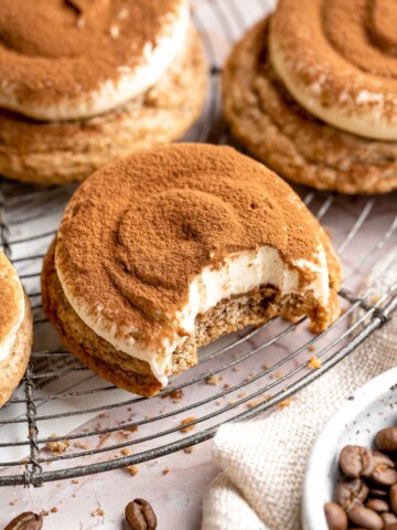 Tiramisu Cookies are soft espresso cookies topped with fluffy mascarpone cream and a dusting of cocoa. Elegant, easy, and perfect for coffee lovers. | aheadofthyme.com
