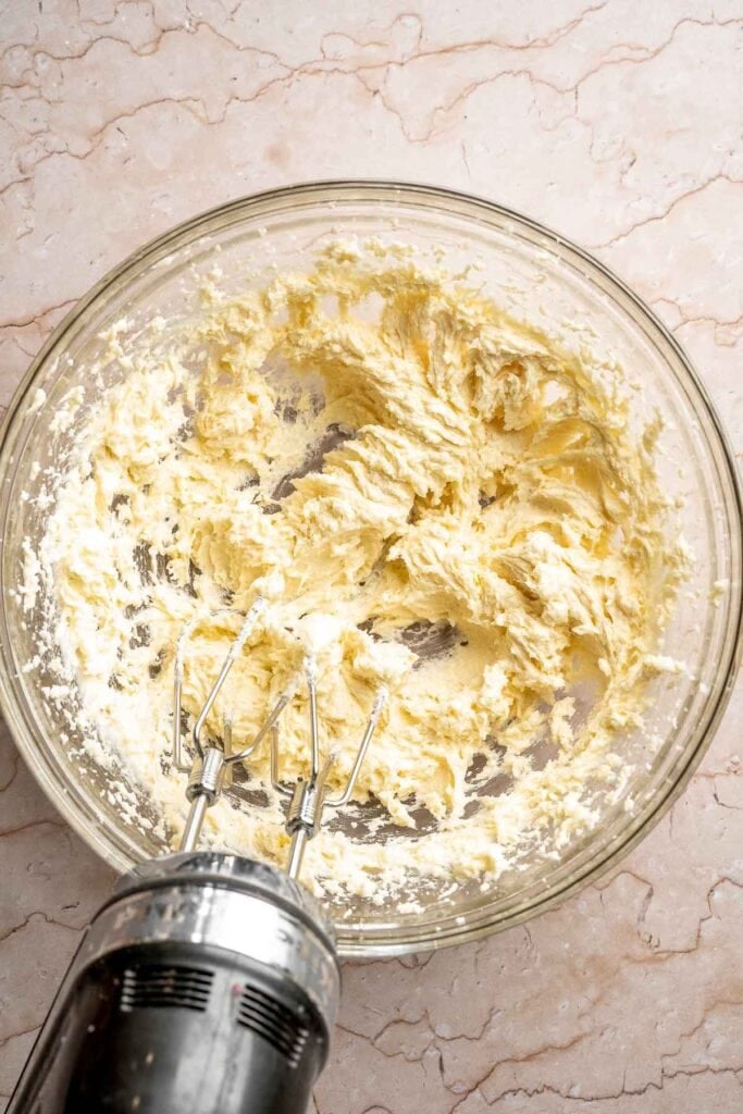 Tiramisu Cookies are soft espresso cookies topped with fluffy mascarpone cream and a dusting of cocoa. Elegant, easy, and perfect for coffee lovers. | aheadofthyme.com