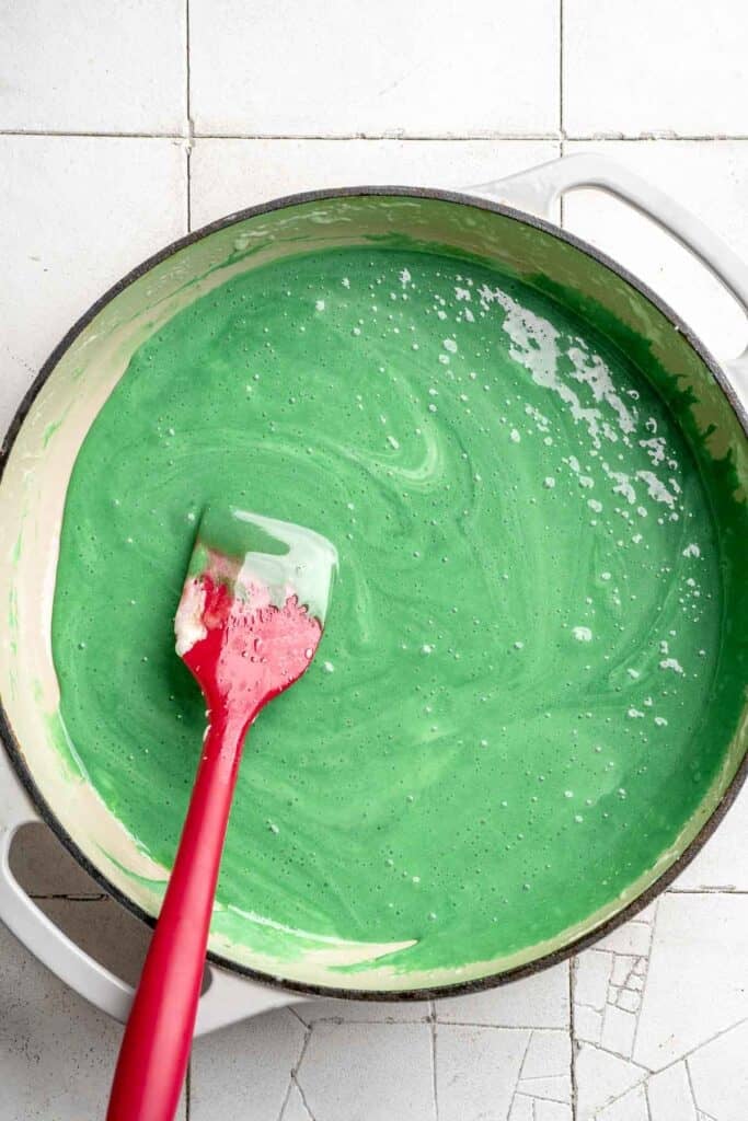 Easy no bake Cornflake Christmas Wreath Cookies made with marshmallows, butter, and green food coloring. They're fun, festive holiday treats everyone loves! | aheadofthyme.com