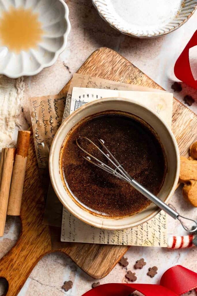 Cozy homemade gingerbread latte recipe made with homemade gingerbread syrup, espresso, warm spices, and steamed milk. | aheadofthyme.com