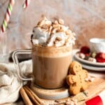 Cozy homemade gingerbread latte recipe made with homemade gingerbread syrup, espresso, warm spices, and steamed milk. | aheadofthyme.com