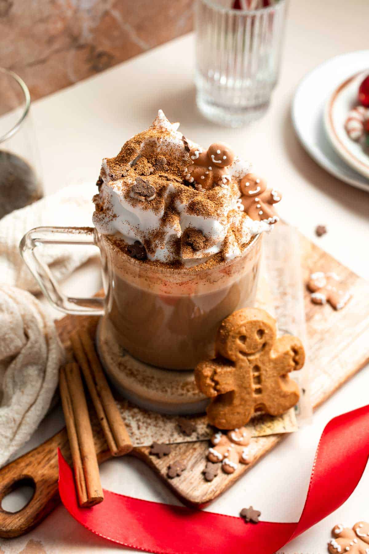 Cozy homemade gingerbread latte recipe made with homemade gingerbread syrup, espresso, warm spices, and steamed milk. | aheadofthyme.com