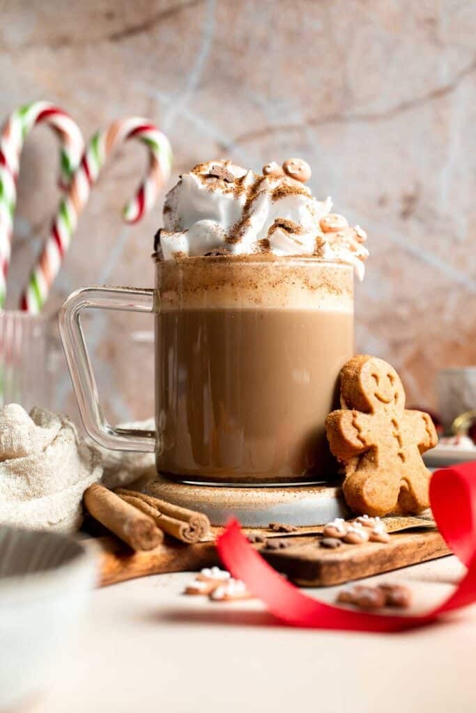 Cozy homemade gingerbread latte recipe made with homemade gingerbread syrup, espresso, warm spices, and steamed milk. | aheadofthyme.com