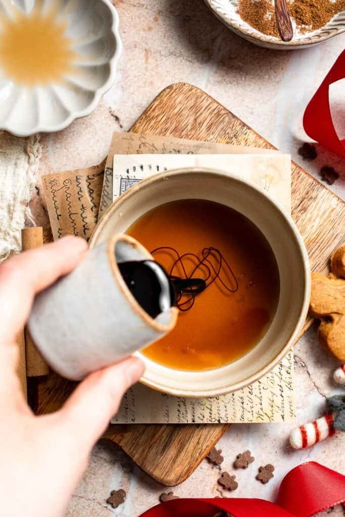 Cozy homemade gingerbread latte recipe made with homemade gingerbread syrup, espresso, warm spices, and steamed milk. | aheadofthyme.com