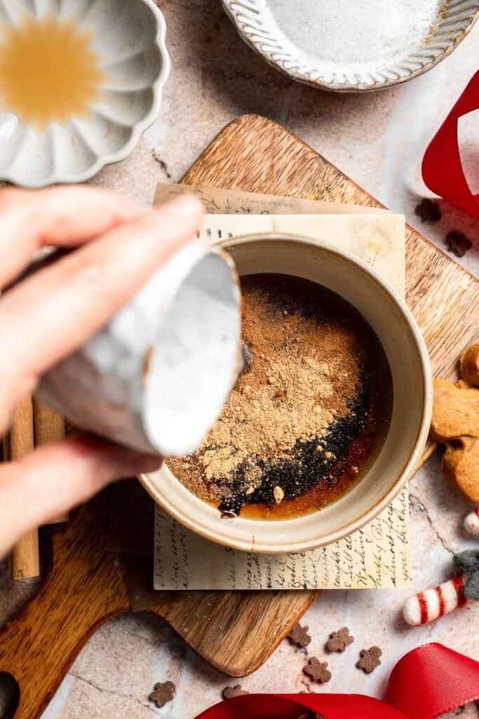 Cozy homemade gingerbread latte recipe made with homemade gingerbread syrup, espresso, warm spices, and steamed milk. | aheadofthyme.com