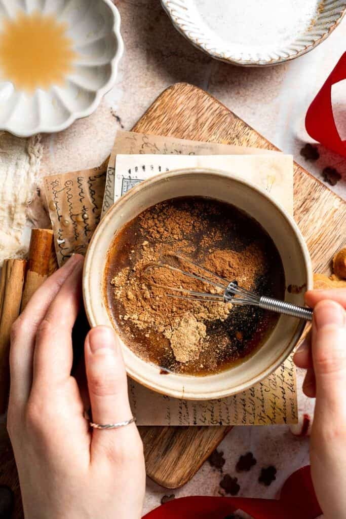 Cozy homemade gingerbread latte recipe made with homemade gingerbread syrup, espresso, warm spices, and steamed milk. | aheadofthyme.com