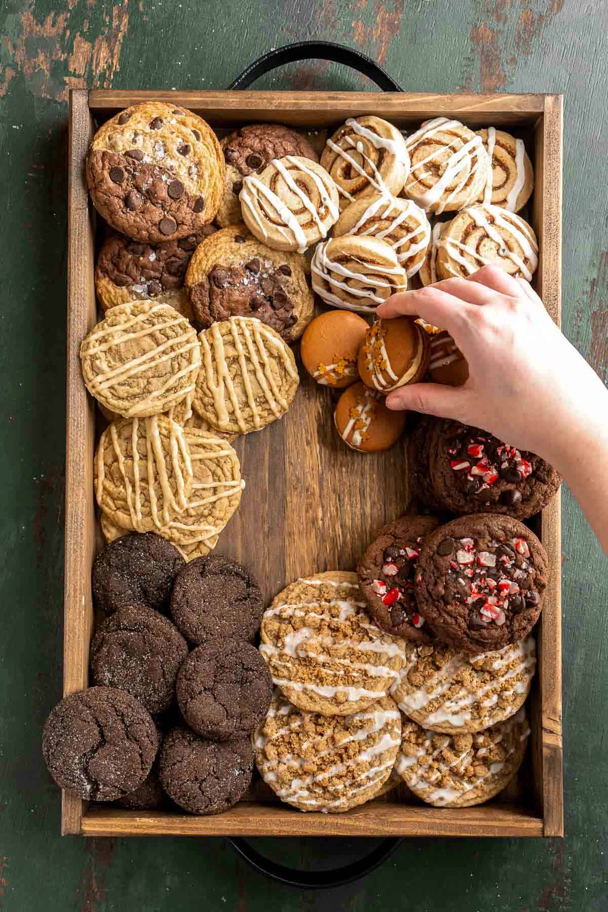 Learn how to host a cookie exchange party with easy planning tips, themes, invitations, setup ideas, and hosting tricks for a festive holiday cookie swap. | aheadofthyme.com