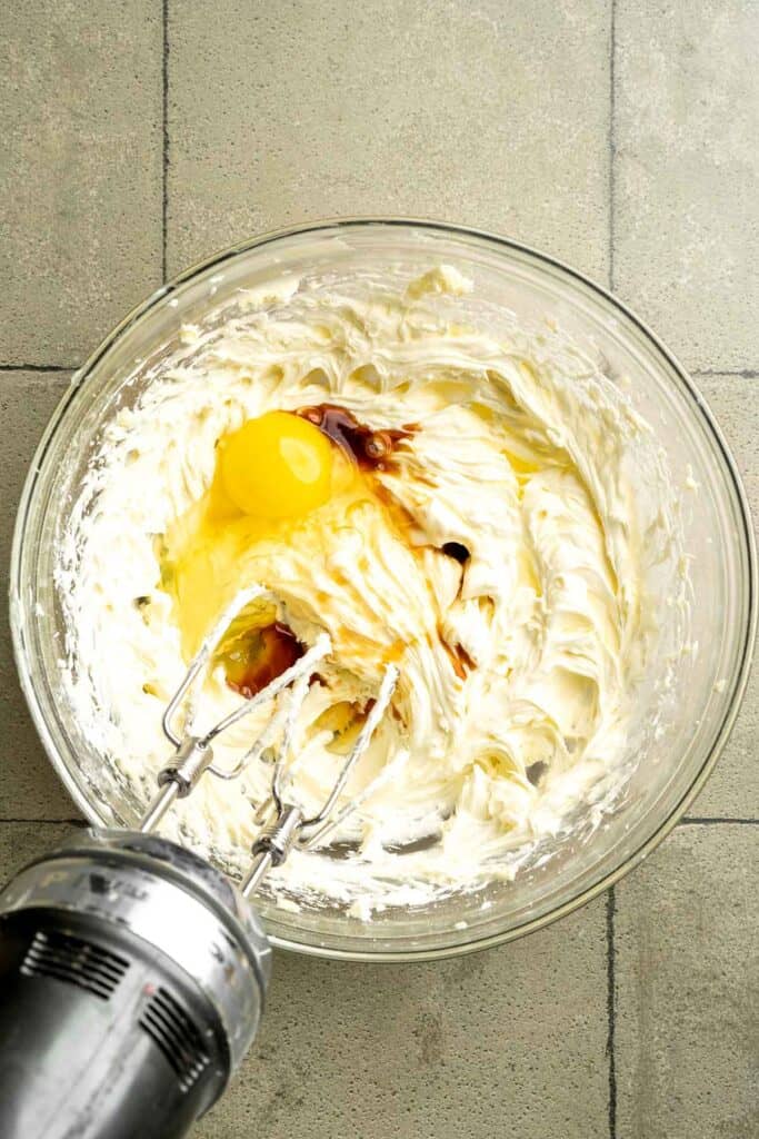 Buttery pistachio thumbprint cookies filled with pistachio white chocolate ganache that bake into elegant, nutty treats perfect for gifting or any occasion. | aheadofthyme.com