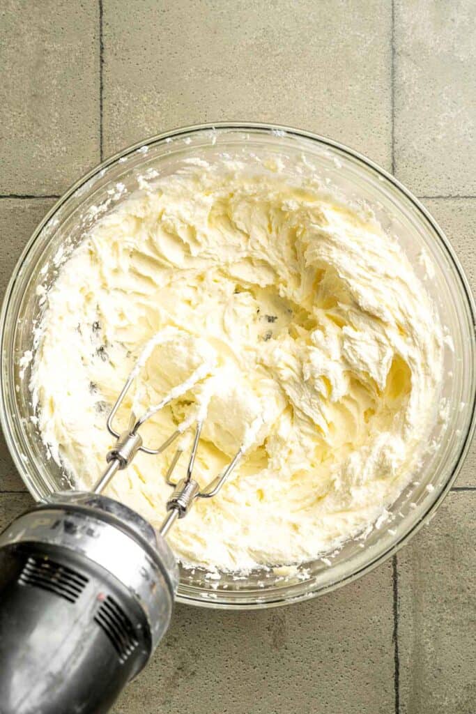 Buttery pistachio thumbprint cookies filled with pistachio white chocolate ganache that bake into elegant, nutty treats perfect for gifting or any occasion. | aheadofthyme.com