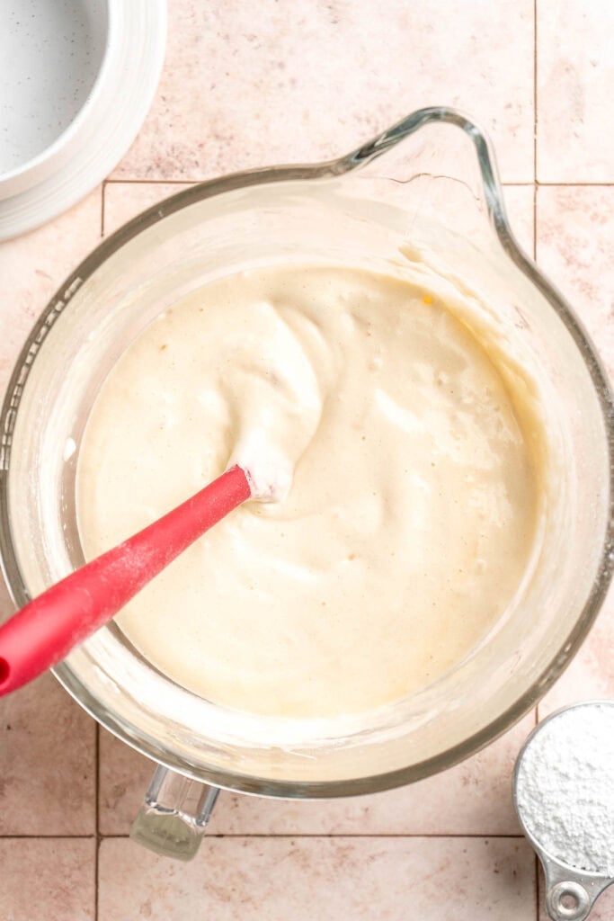 Light and fluffy vanilla Swiss roll cake filled with whipped cream, made with a soft sponge that rolls beautifully every time. | aheadofthyme.com