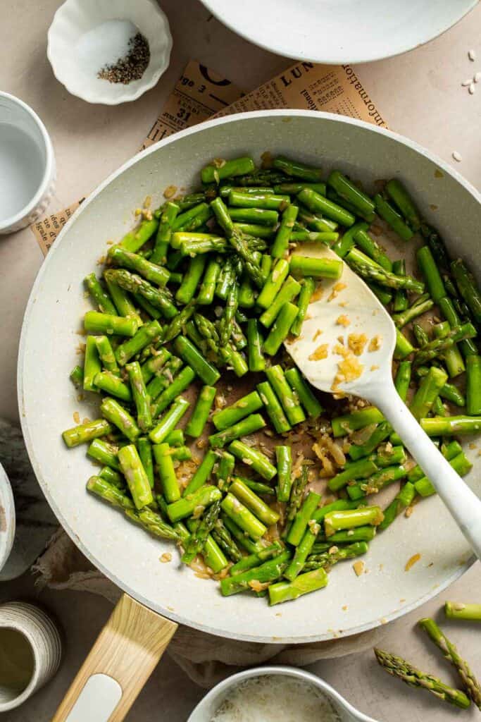 Creamy lemon asparagus risotto with Parmesan, bright spring flavors, and simple steps. Easy, elegant, and perfect for weeknight or entertaining meals. | aheadofthyme.com