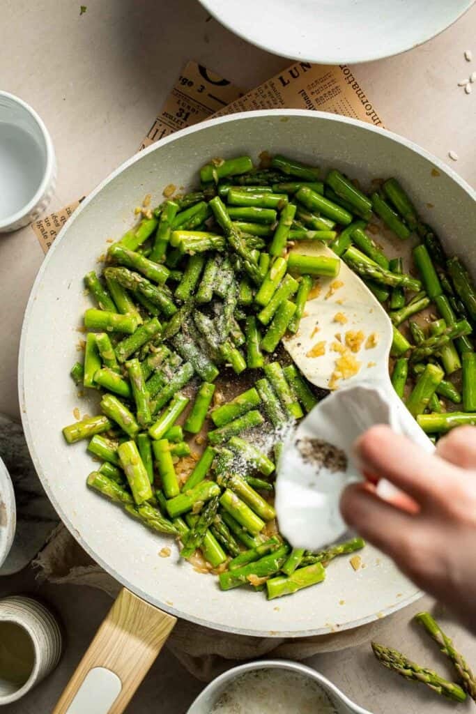 Creamy lemon asparagus risotto with Parmesan, bright spring flavors, and simple steps. Easy, elegant, and perfect for weeknight or entertaining meals. | aheadofthyme.com