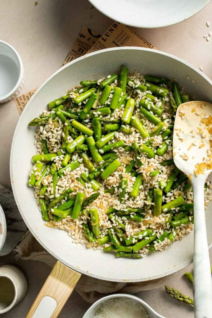 Creamy lemon asparagus risotto with Parmesan, bright spring flavors, and simple steps. Easy, elegant, and perfect for weeknight or entertaining meals. | aheadofthyme.com