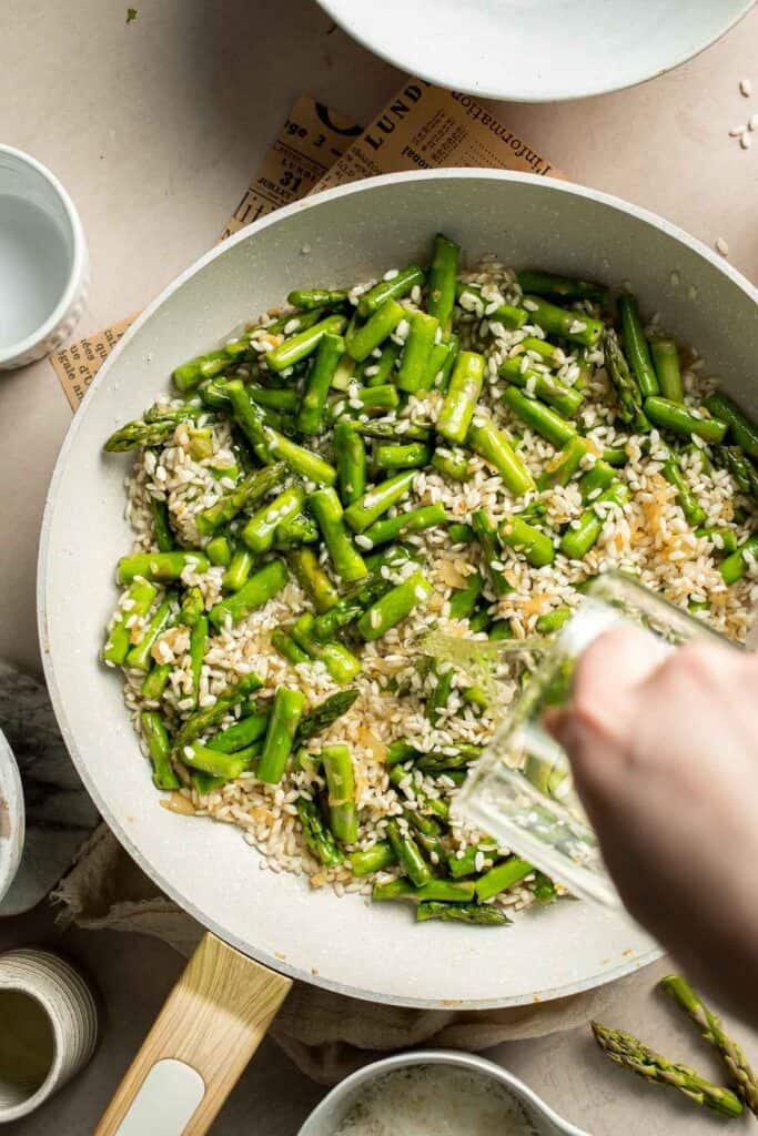 Creamy lemon asparagus risotto with Parmesan, bright spring flavors, and simple steps. Easy, elegant, and perfect for weeknight or entertaining meals. | aheadofthyme.com