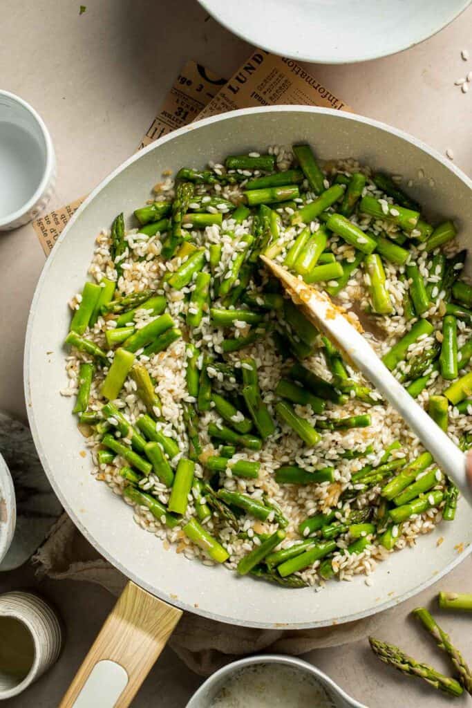 Creamy lemon asparagus risotto with Parmesan, bright spring flavors, and simple steps. Easy, elegant, and perfect for weeknight or entertaining meals. | aheadofthyme.com