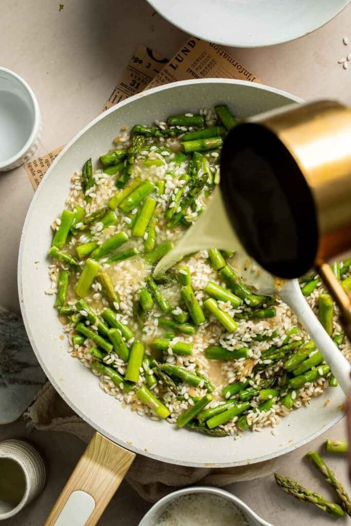 Creamy lemon asparagus risotto with Parmesan, bright spring flavors, and simple steps. Easy, elegant, and perfect for weeknight or entertaining meals. | aheadofthyme.com