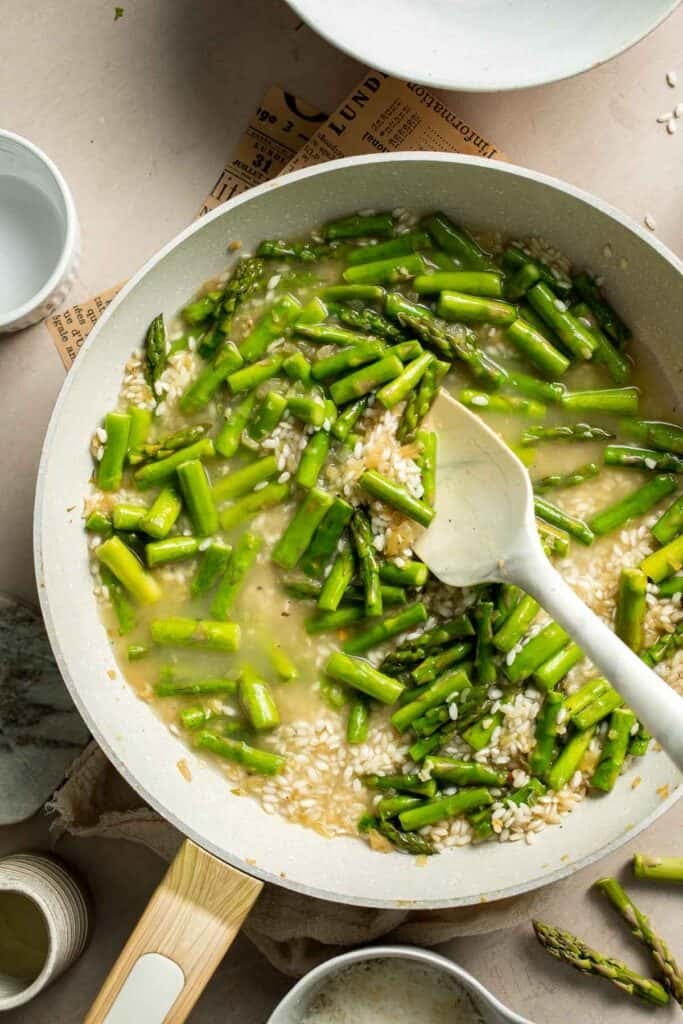 Creamy lemon asparagus risotto with Parmesan, bright spring flavors, and simple steps. Easy, elegant, and perfect for weeknight or entertaining meals. | aheadofthyme.com