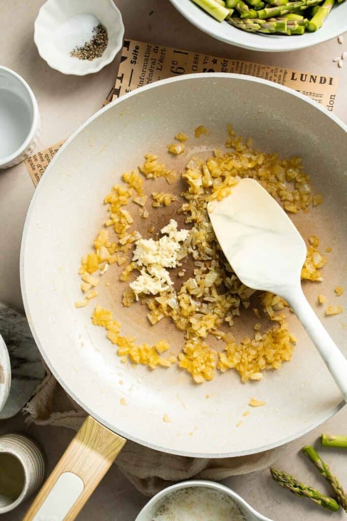 Creamy lemon asparagus risotto with Parmesan, bright spring flavors, and simple steps. Easy, elegant, and perfect for weeknight or entertaining meals. | aheadofthyme.com