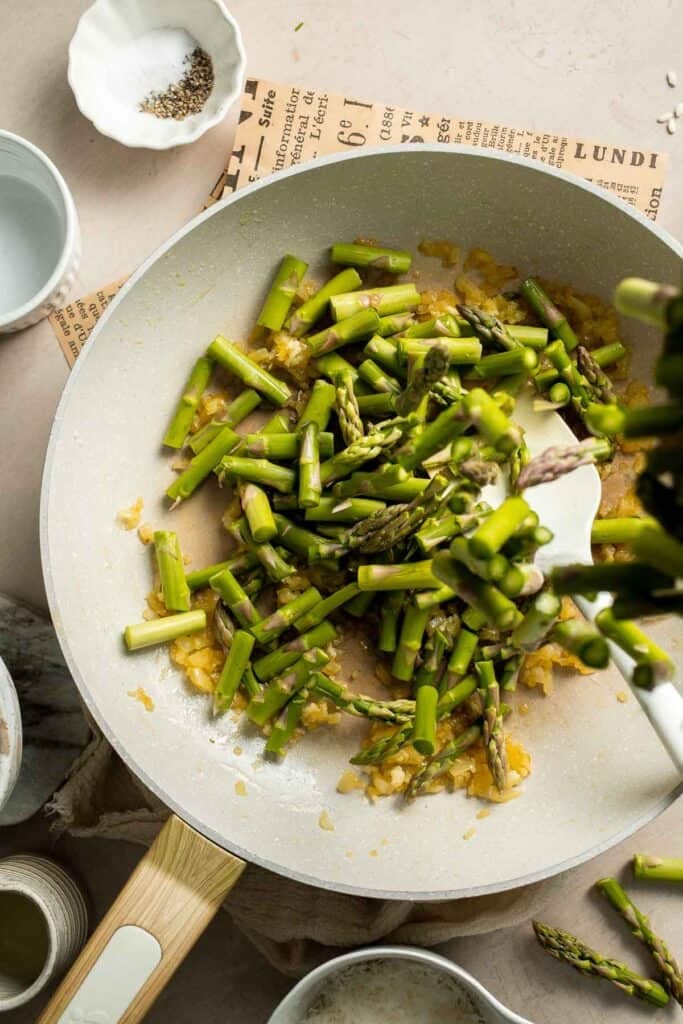 Creamy lemon asparagus risotto with Parmesan, bright spring flavors, and simple steps. Easy, elegant, and perfect for weeknight or entertaining meals. | aheadofthyme.com