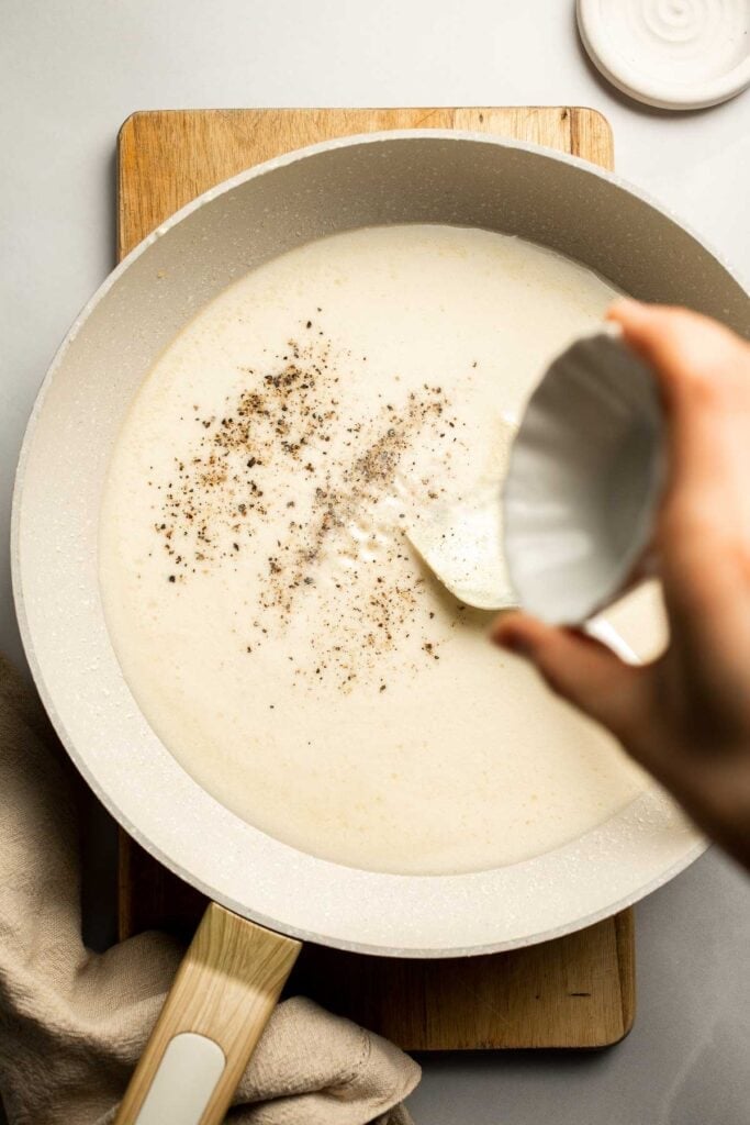 Creamy cottage cheese alfredo pasta made with simple ingredients, high protein, lighter than traditional alfredo, and ready in 20 minutes. | aheadofthyme.com