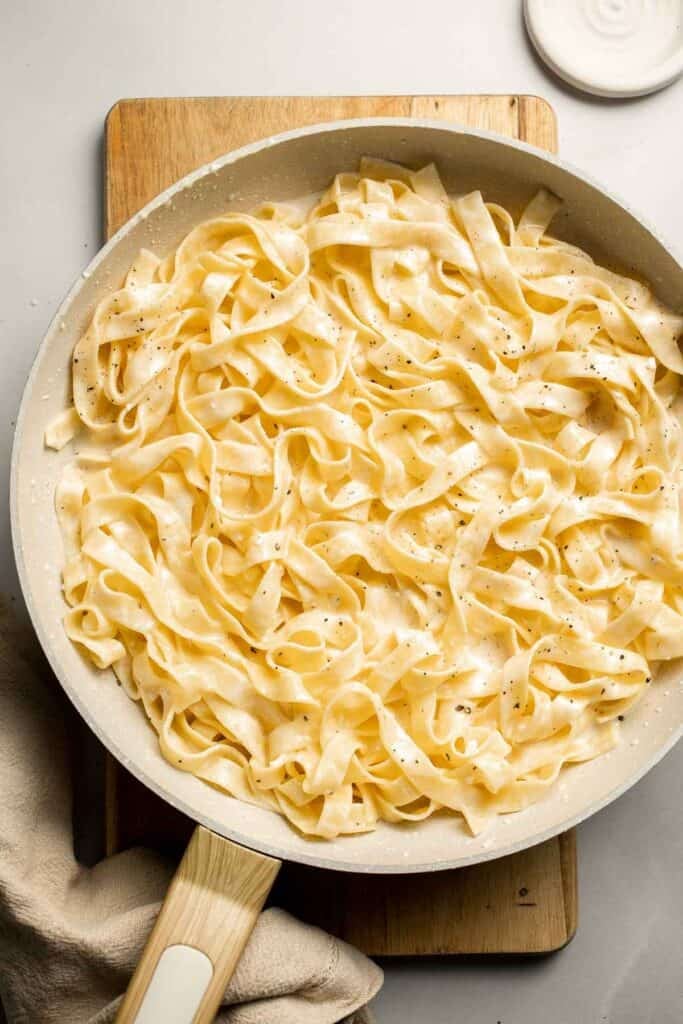 Creamy cottage cheese alfredo pasta made with simple ingredients, high protein, lighter than traditional alfredo, and ready in 20 minutes. | aheadofthyme.com