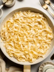 Creamy cottage cheese alfredo pasta made with simple ingredients, high protein, lighter than traditional alfredo, and ready in 20 minutes. | aheadofthyme.com