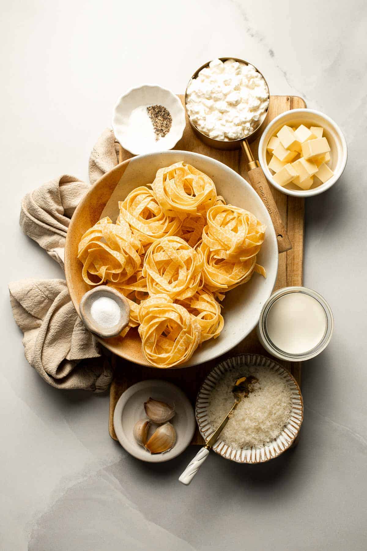 Creamy cottage cheese alfredo pasta made with simple ingredients, high protein, lighter than traditional alfredo, and ready in 20 minutes. | aheadofthyme.com
