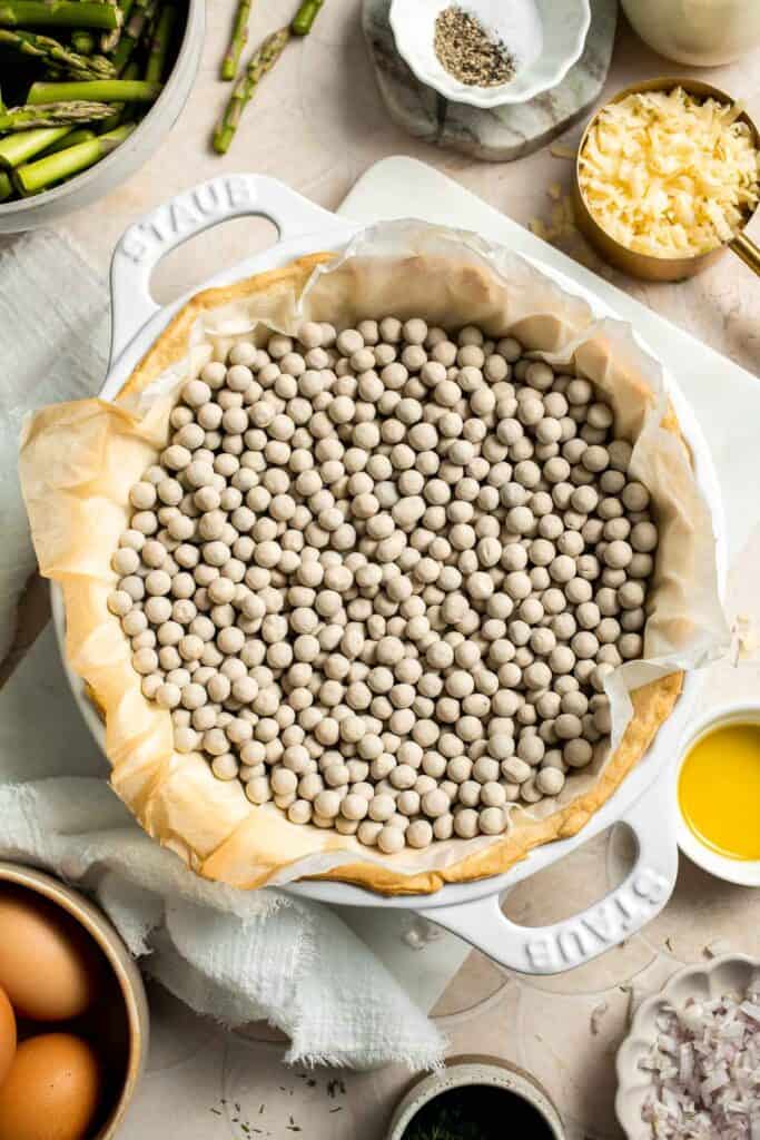 Creamy asparagus quiche with Gruyère cheese, flaky crust, and fresh dill, perfect for spring brunch, meal prep, or light dinner. | aheadofthyme.com