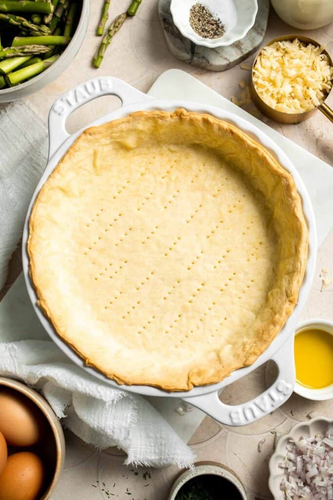 Creamy asparagus quiche with Gruyère cheese, flaky crust, and fresh dill, perfect for spring brunch, meal prep, or light dinner. | aheadofthyme.com