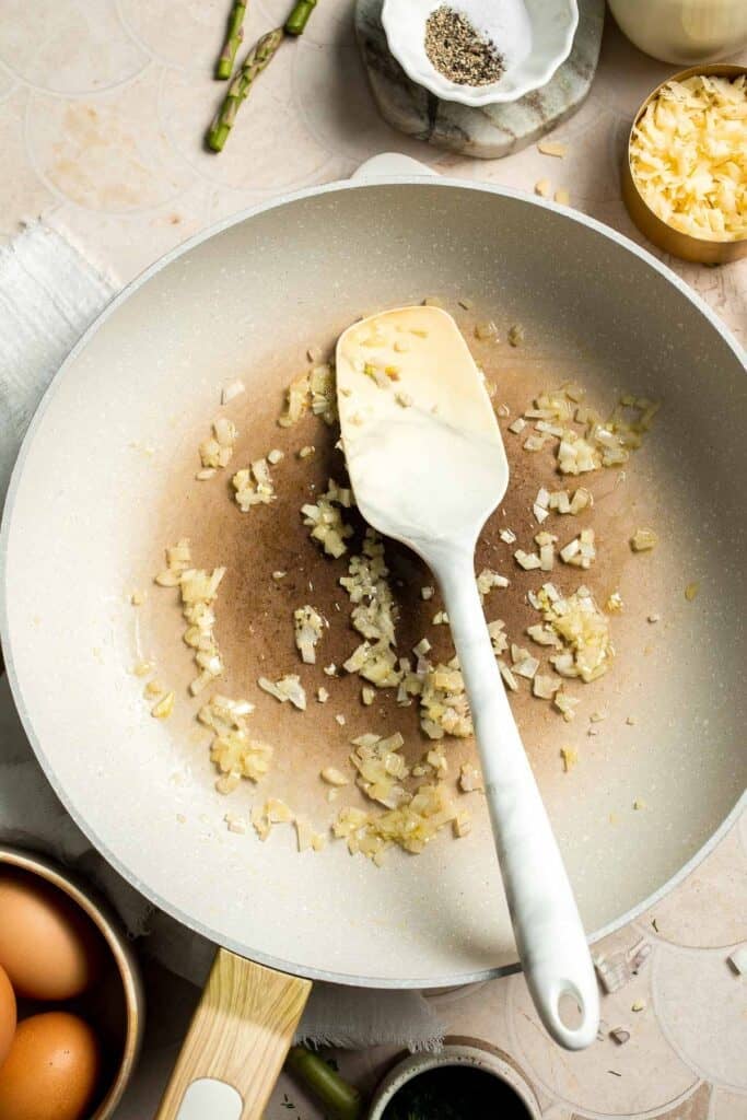 Creamy asparagus quiche with Gruyère cheese, flaky crust, and fresh dill, perfect for spring brunch, meal prep, or light dinner. | aheadofthyme.com