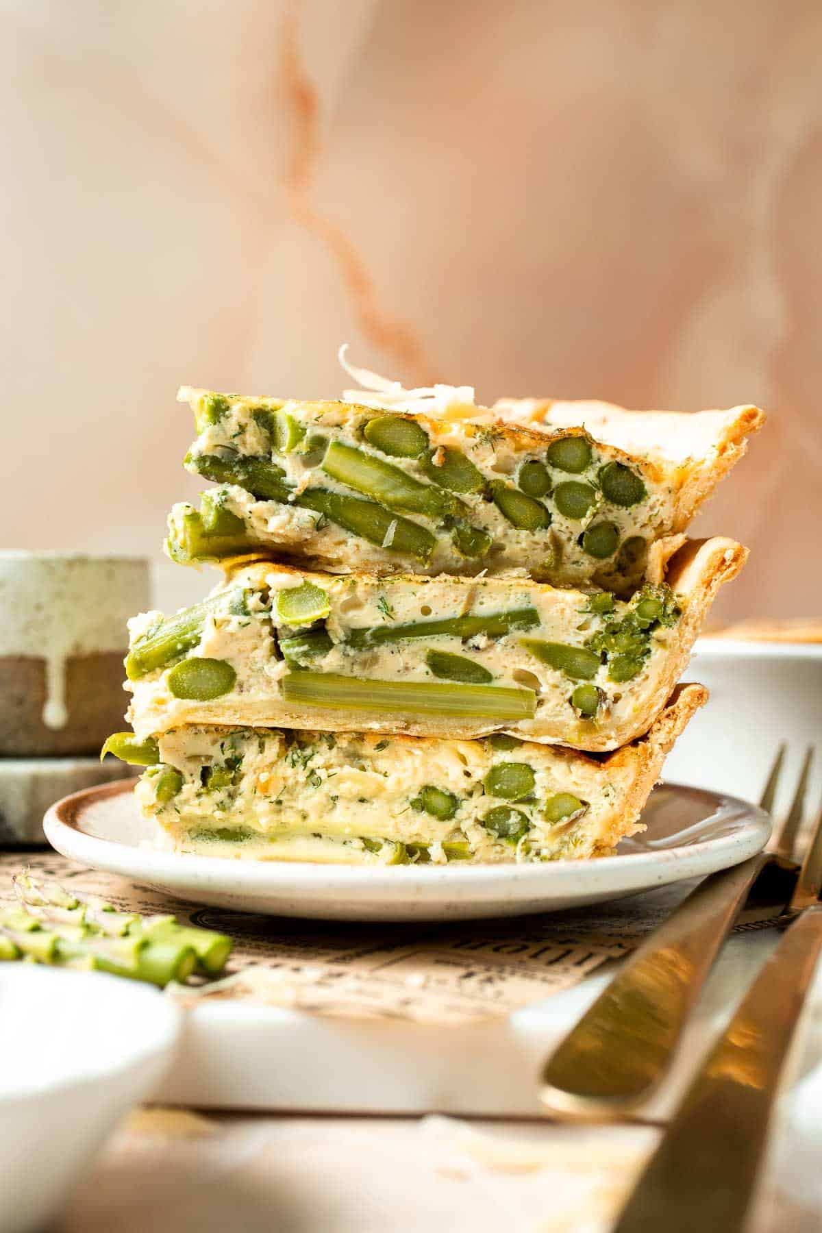 Creamy asparagus quiche with Gruyère cheese, flaky crust, and fresh dill, perfect for spring brunch, meal prep, or light dinner. | aheadofthyme.com