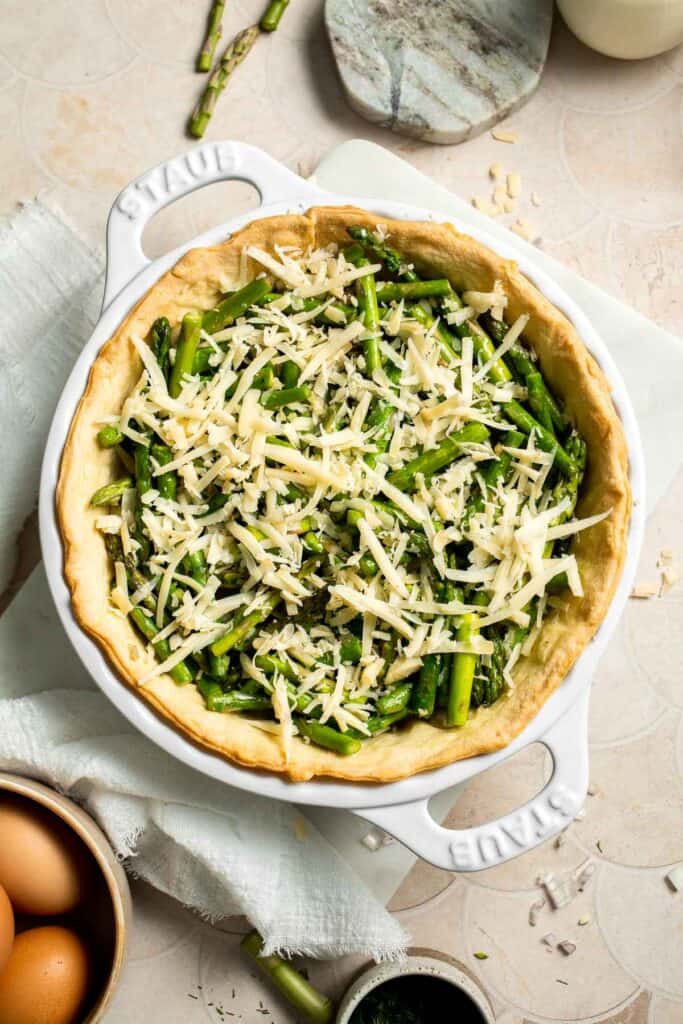 Creamy asparagus quiche with Gruyère cheese, flaky crust, and fresh dill, perfect for spring brunch, meal prep, or light dinner. | aheadofthyme.com