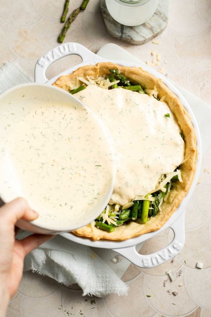 Creamy asparagus quiche with Gruyère cheese, flaky crust, and fresh dill, perfect for spring brunch, meal prep, or light dinner. | aheadofthyme.com