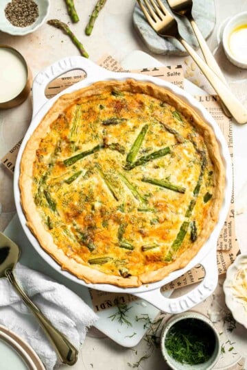 Creamy asparagus quiche with Gruyère cheese, flaky crust, and fresh dill, perfect for spring brunch, meal prep, or light dinner. | aheadofthyme.com