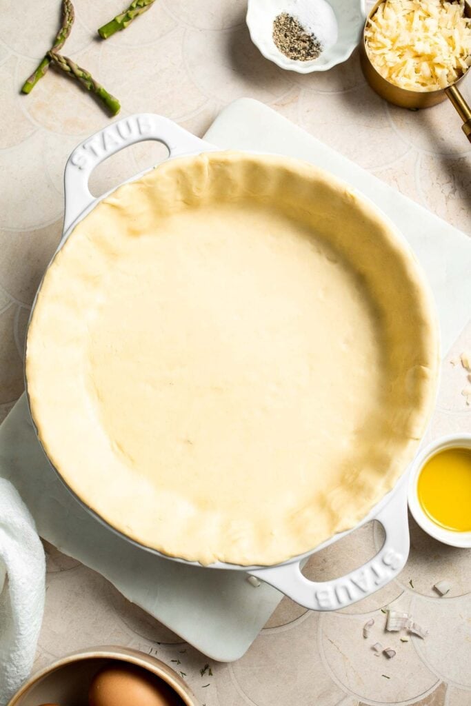 Creamy asparagus quiche with Gruyère cheese, flaky crust, and fresh dill, perfect for spring brunch, meal prep, or light dinner. | aheadofthyme.com