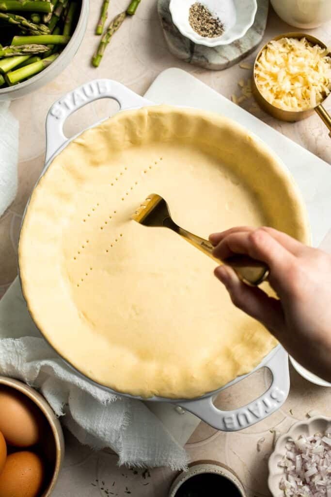 Creamy asparagus quiche with Gruyère cheese, flaky crust, and fresh dill, perfect for spring brunch, meal prep, or light dinner. | aheadofthyme.com