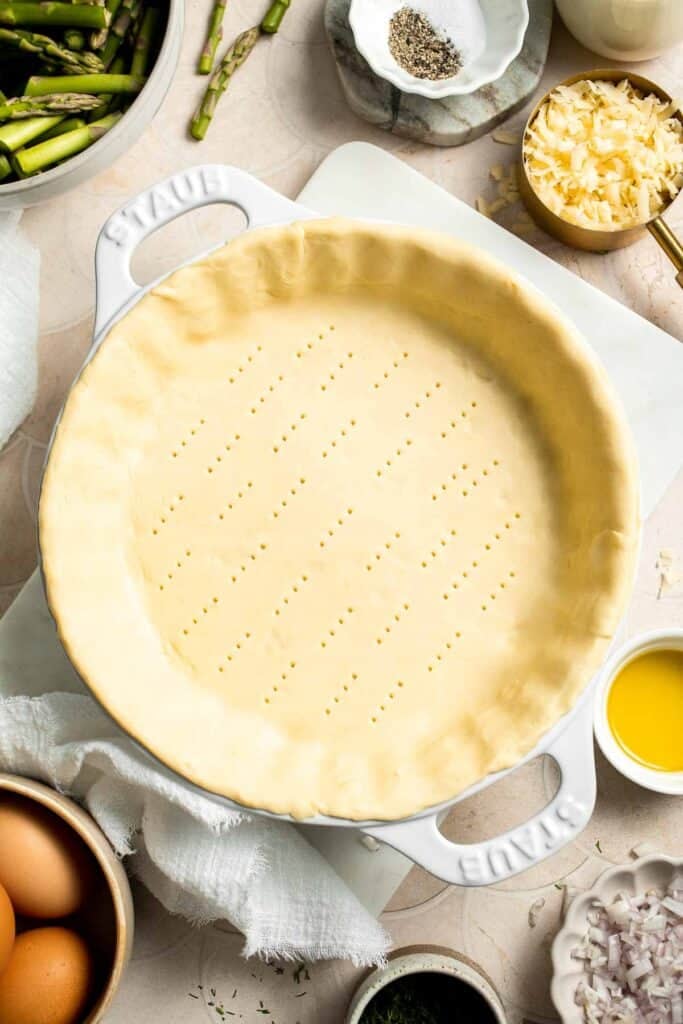 Creamy asparagus quiche with Gruyère cheese, flaky crust, and fresh dill, perfect for spring brunch, meal prep, or light dinner. | aheadofthyme.com