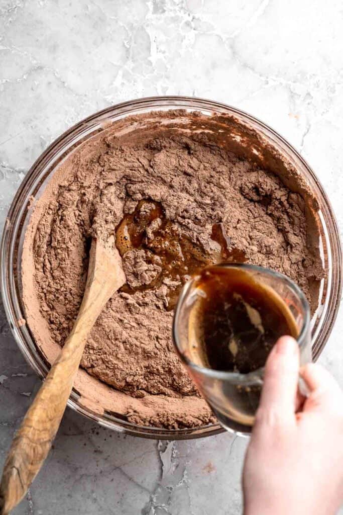 Chocolate mousse cake with rich layers, fluffy mousse, and glossy ganache. Easy, decadent dessert perfect for celebrations and chocolate lovers. | aheadofthyme.com