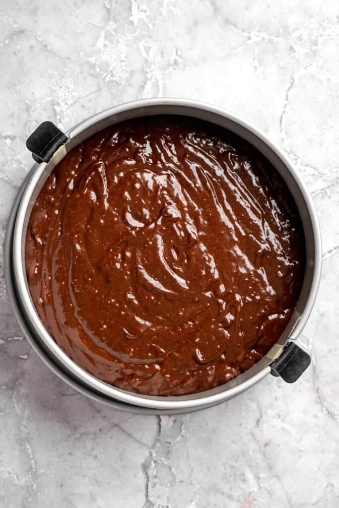 Chocolate mousse cake with rich layers, fluffy mousse, and glossy ganache. Easy, decadent dessert perfect for celebrations and chocolate lovers. | aheadofthyme.com