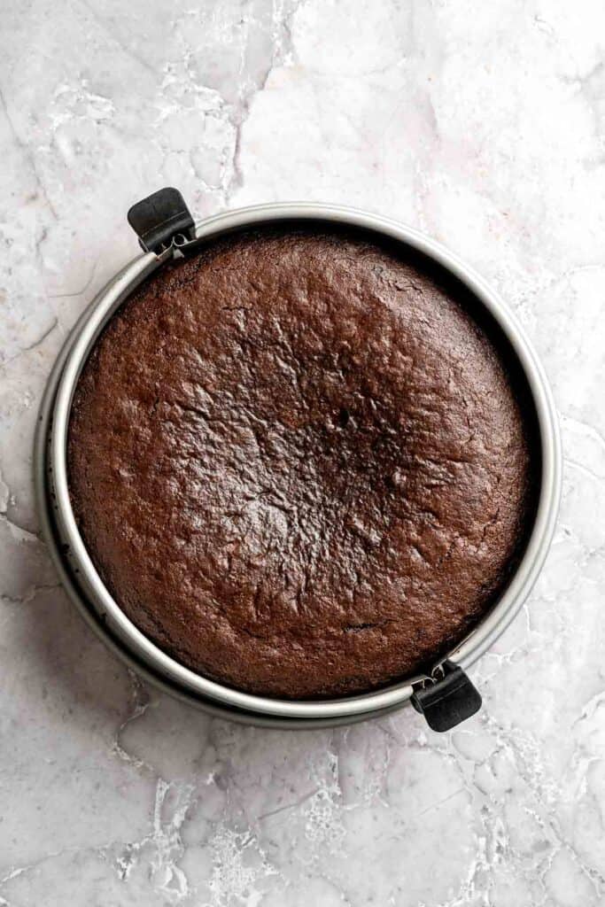 Chocolate mousse cake with rich layers, fluffy mousse, and glossy ganache. Easy, decadent dessert perfect for celebrations and chocolate lovers. | aheadofthyme.com