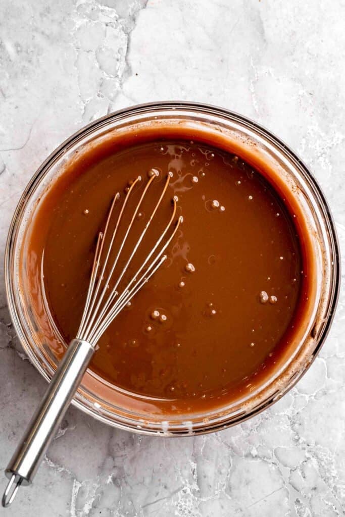 Chocolate mousse cake with rich layers, fluffy mousse, and glossy ganache. Easy, decadent dessert perfect for celebrations and chocolate lovers. | aheadofthyme.com